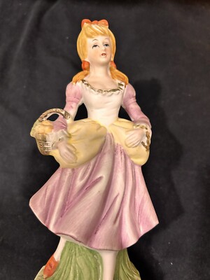 Napoleon Brand Girl Ceramic Figure with Nativity Character Basket.