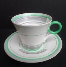 A Shelley "Bands & Lines" 12132/G Regent shape demitasse cup & saucer C.1933.