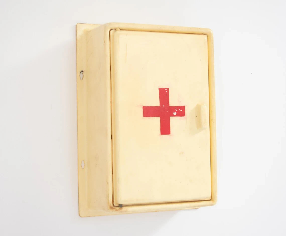 Vintage plastic medicine Bathroom wall Red cross