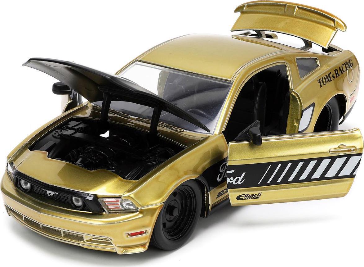 BTM 2010 Ford Mustang GT Tom’s Racing 2010 Ford Mustang GT Gold Metallic with Black Graphics and