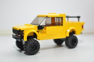 Yellow Tacoma Truck Overlander Model Compatible and Built with