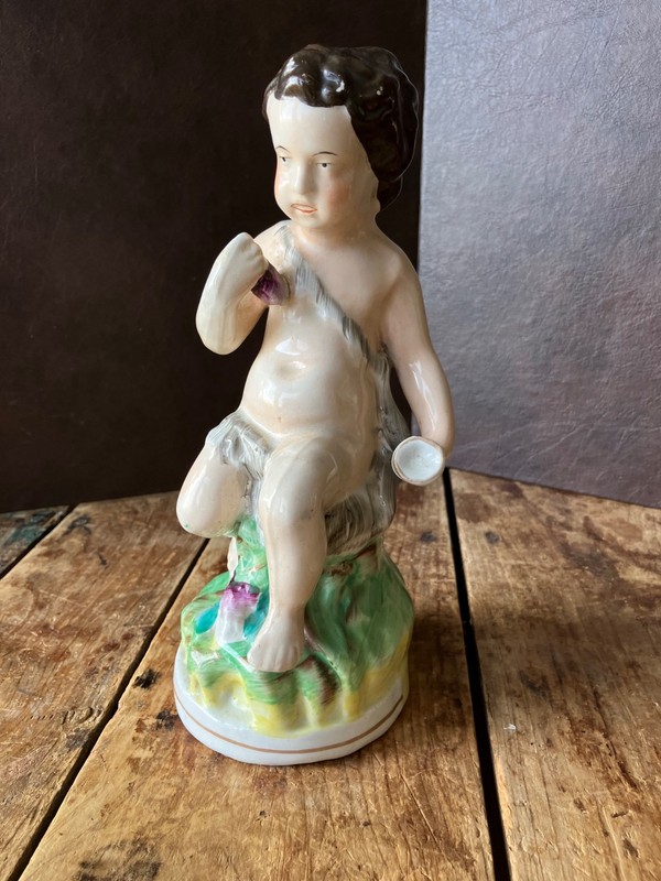 Antique 19th Century Staffordshire Porcelain Figurine Of A Bacchanalian child