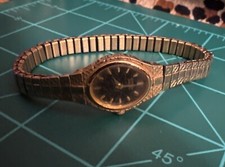 Vintage Citizen Quartz Gold Tone Black Bracelet Stretch Watch 0673