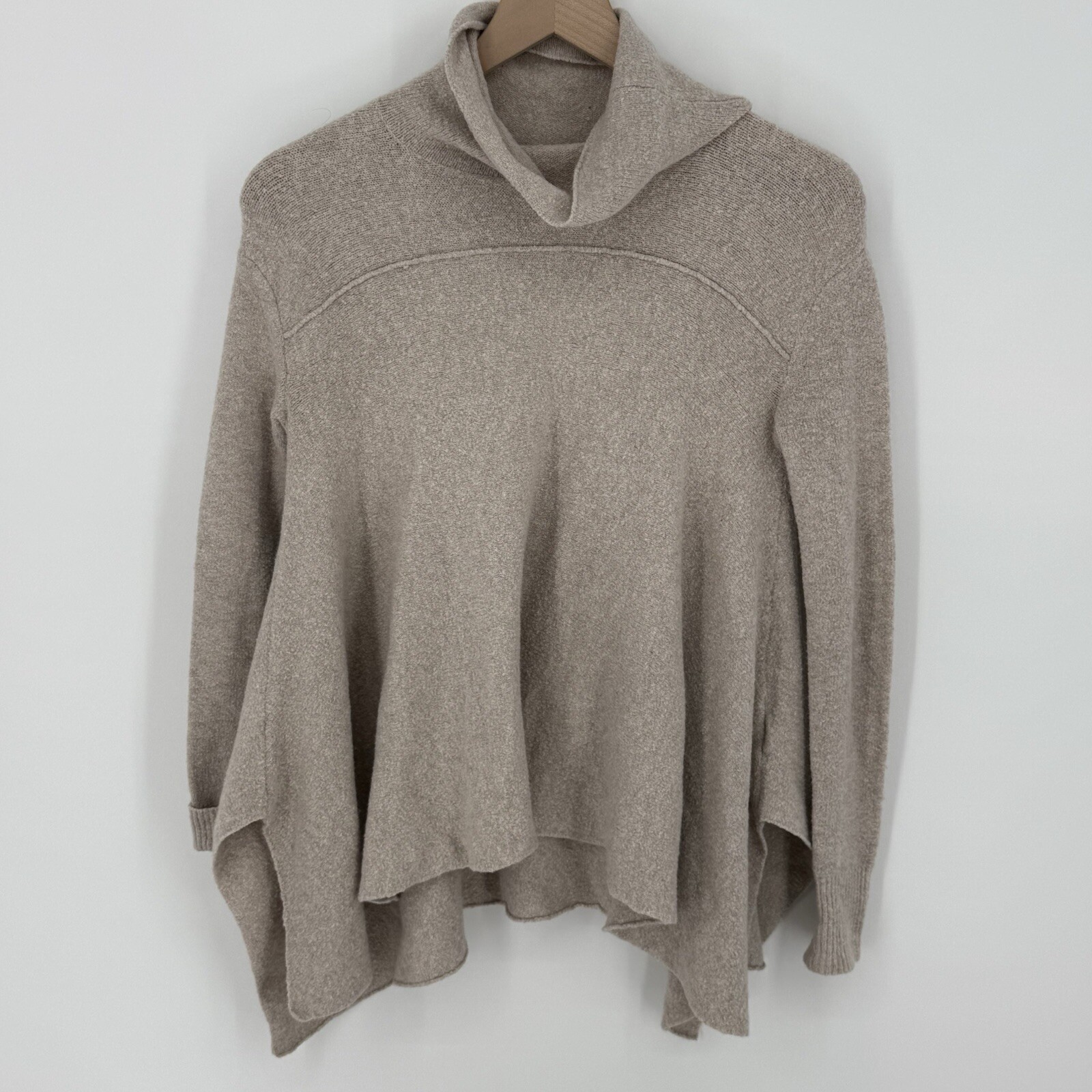 Sleeveless Turtleneck Asymmetrical Sweater