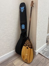 Traditional Kazakh Dombra Two-String Instrument with Ornate Design and Protectiv