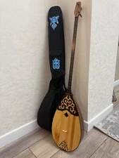 Traditional Kazakh Dombra Two-String Instrument with Ornate Design and Protectiv