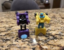 Two Mini Vintage Transformer Toy Cars