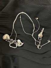 bag charm, Stylish metal, white and silver color, goes with luxury bags.
