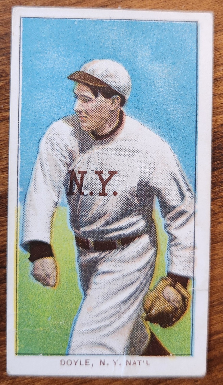 1909-11 T206 Sweet Caporal Larry Doyle Throwing Series 150 Factory 25 RAW VG