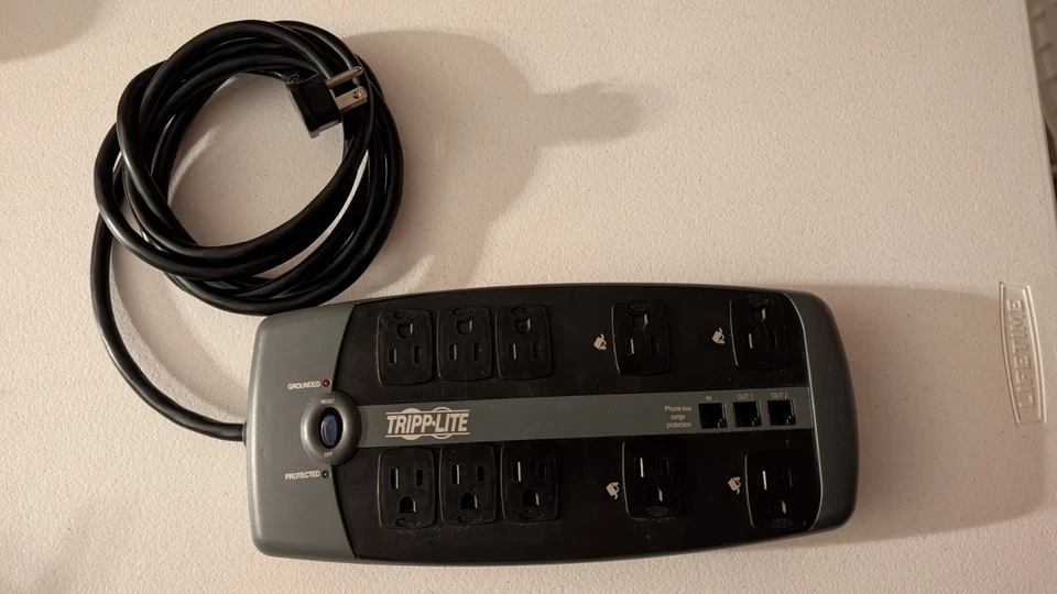 Tripp Lite 10-Outlet 8ft Cord Tel DSL Protection Rj11 Surge Protect Power Strip - Image 4 of 4