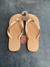 Image of Havaianas Brasil Logo flip-flops in a peach colorway. Uk 8/9