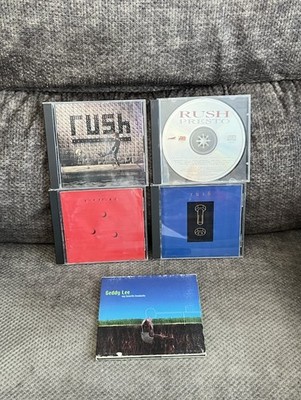 Rush CD Lot Of 4 Hold Your Fire,Presto,Counterparts,Roll The Bones+ Geddy Lee CD