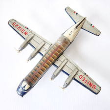 Vintage Nomura TN United DC-7 Mainliner Tin Friction Airplane Visible Cabin RARE