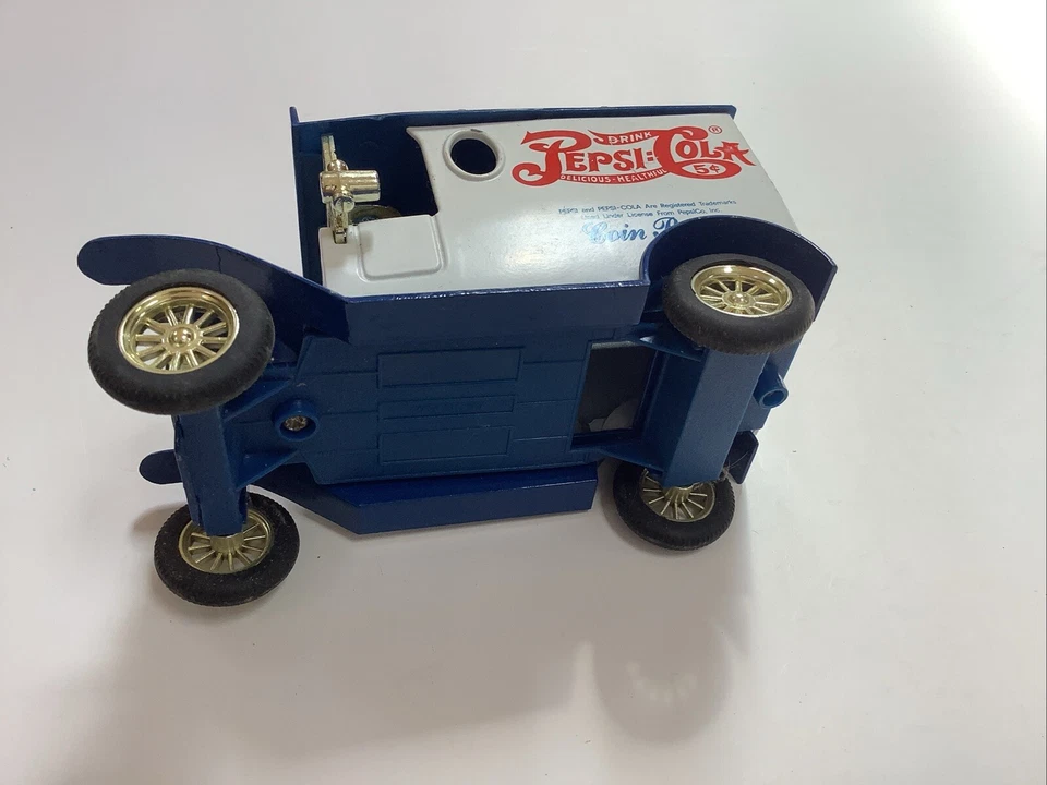 Banco de monedas Pepsi-Cola azul y blanco Foto 2 de 3