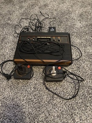 VINTAGE ATARI CX-2600 A GAME CONSOLE W/ 2 GAME CONTROLLERS 