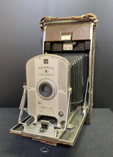 Macchina fotografica terrestre Polaroid vintage in pelle pieghevole modello 95 anni 50 COSÌ COM'È vintage Prop