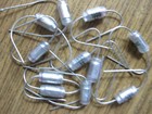 10  NOS Kleine Kondensatoren 1,8 nF  3% (H)  10x4,5mm.  Lange Drähte