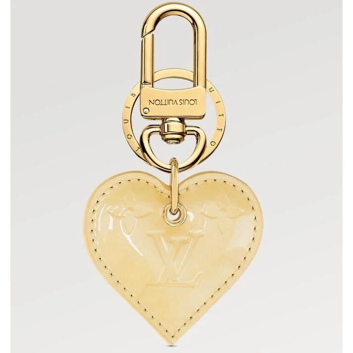 louis heart bag charm