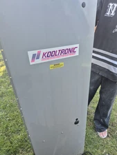 Kooltronic air conditioner label, model K2A4C12WP52, with 12000 BTU cooling,...