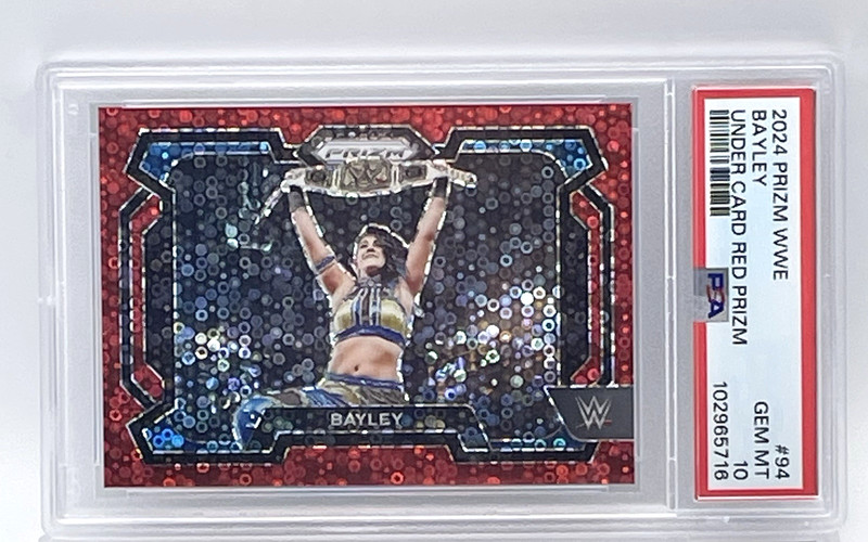 BAYLEY - 2024 PANINI PRIZM WWE UNDER CARD RED PRIZM #57/99 - PSA 10 GEM MINT