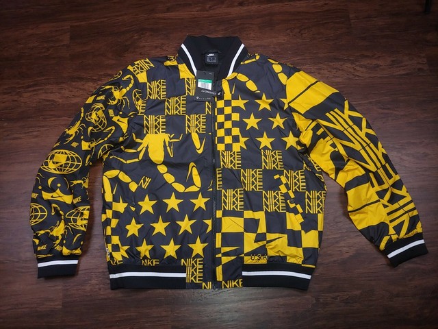 nike black and yellow jacket
