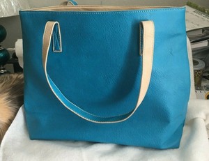large blue handbag