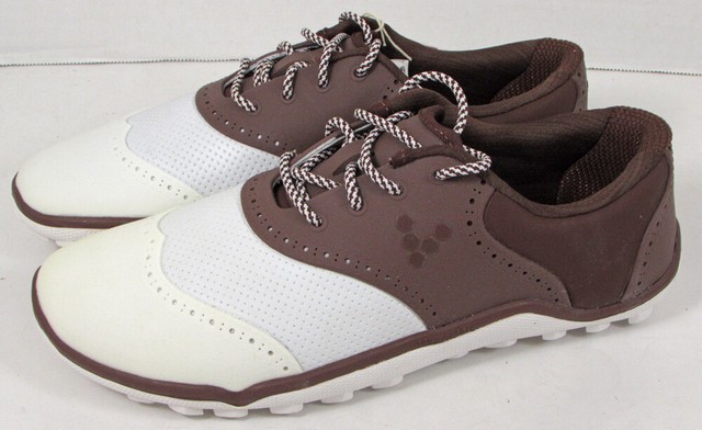 white and pink puma shoes