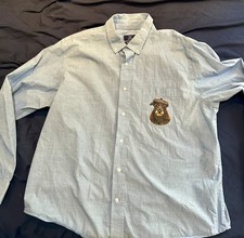 Mens XL Denim button down long sleeve shirt "Who let the dogs out" on pocket.