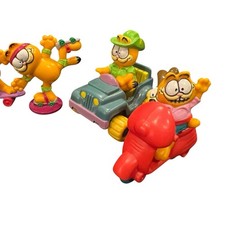 Preços baixos em McDonald's Garfield Brinquedos de personagens de
