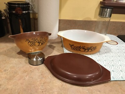 pyrex. 2 small units. One with lid. No chips. No cracks