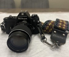 Nikon EM 35mm Camera w/Albinar ADG 1:28 F 135mm 52mm Lens Untested  READ 