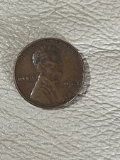 1947 Lincoln Wheat Penny No Mint Mark One Cent Coin. 1947 Lincoln Wheat Penny No Mint Mark One Cent Coin.