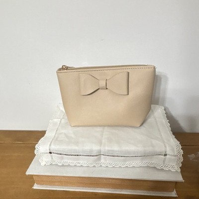 Beige Faux Leather Makeup Bag with Bow, Zipper, and Star Pattern Lining