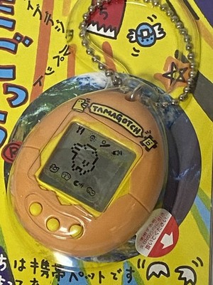 BANDAI Tamagotchi Original First Generation Orange 1996 New Sealed