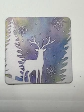 Christmas seen, white winter deer in the snow, purple, pine trees, fridge magnet