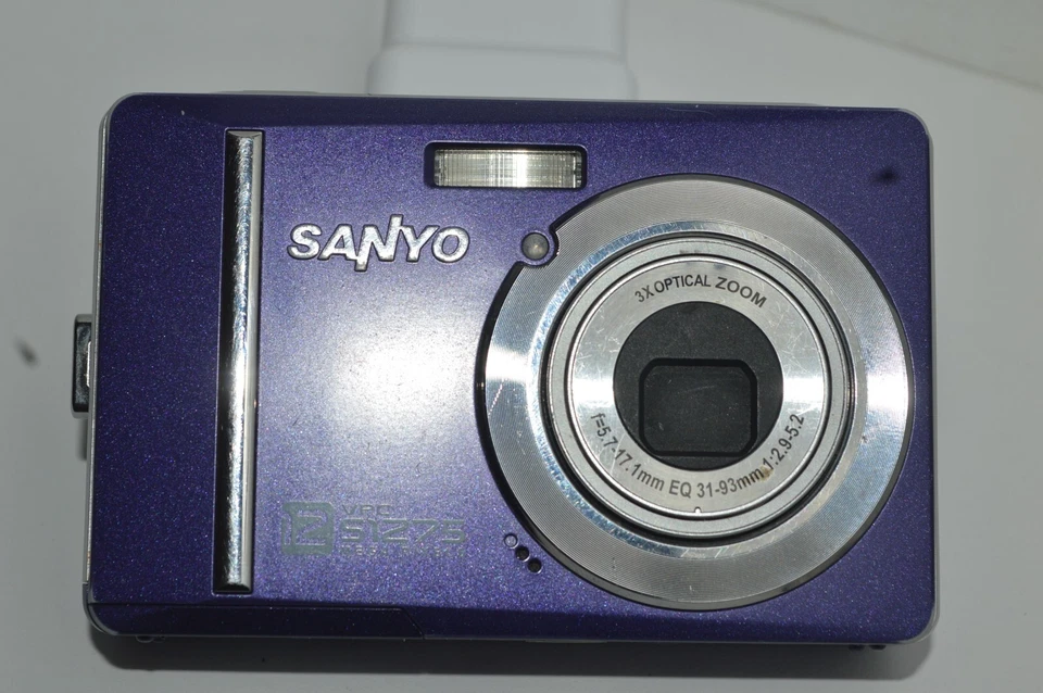 Cámara digital SANYO VPC-S1275 12 MP azul oscuro solo para reparación de piezas Foto 2 de 4