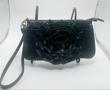 Steve Madden Clutch wristlet Black Rose Detail animal print lining