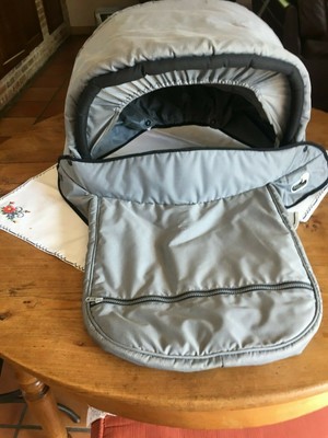 tablier poussette bebe confort