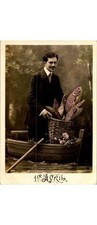 Postal francesa del Día de los Inocentes de 1900 - Hombre en barco - ¿Adivina quién? St Romain de Brete