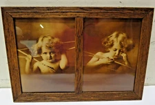 2 Antique Wood Framed Cupid Awake Asleep Taber Prang Art Co