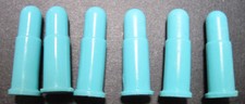 Six turquoise replacement plastic bullets for cap gun holster