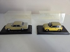 Hachette Norev 1/43 Nissan (x2) Be-1 (1987) & Laurel (1969) - Yellow (fading)