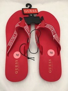 red guess flip flops