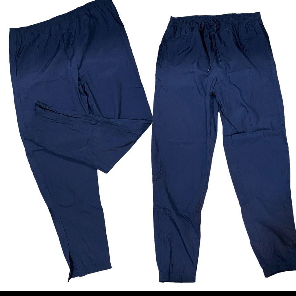 Pantalones deportivos Reebok para hombre azul cintura elástica tobillo cremallera cortavientos M Foto 2 de 4
