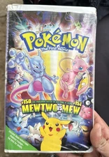 Pokemon The First Movie Mewtwo vs Mew  VHS Clamshell Pikachu Charizard