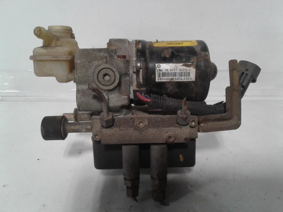 Conjunto de bomba y motor ABS usado se adapta a: conjunto Chrysler New Yorker 1994 (tracción delantera) con Foto 3 de 4