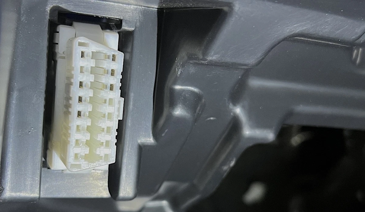 OBDII port underneath dashboard