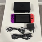 Nintendo Switch Purple And Red Joycons Dock And Wires