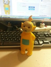 Yellow Teletubbies La La Figure 1996 Hasbro 6 3/4 inches high Nice example.
