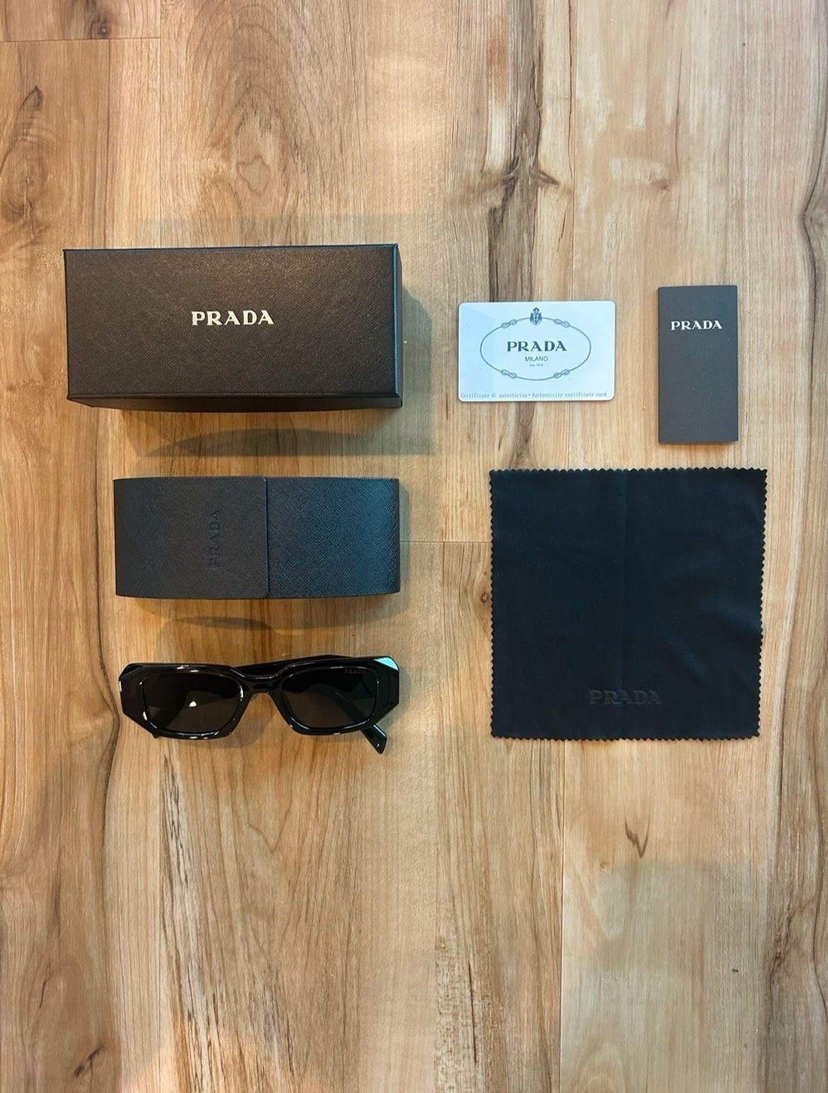 Prada PR17WS Black Women's Sunglasses with Dark Grey Lenses 49mm